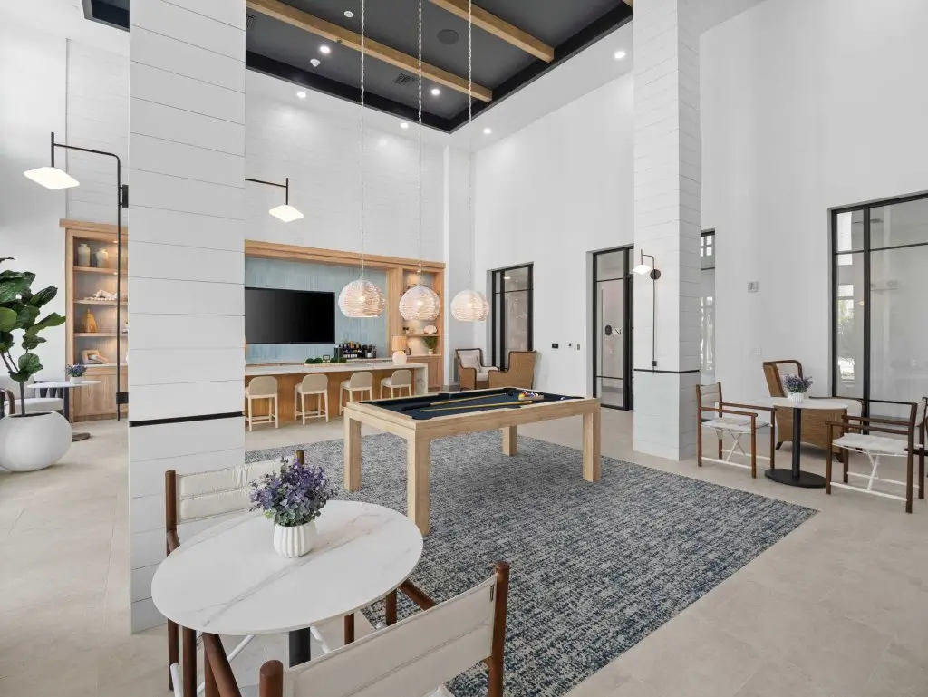 luxury palm bay apartment clubhouse with gameroom pool table and seating at Tides at Palm Bay apartments