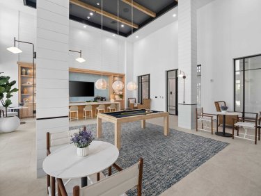 luxury palm bay apartment clubhouse with gameroom pool table and seating at Tides at Palm Bay apartments
